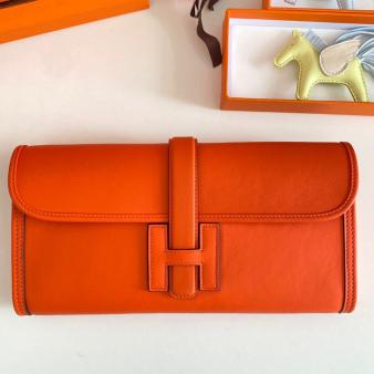 Hermes Jige Elan 29 Clutch Bag In Swift Orange Calfskin